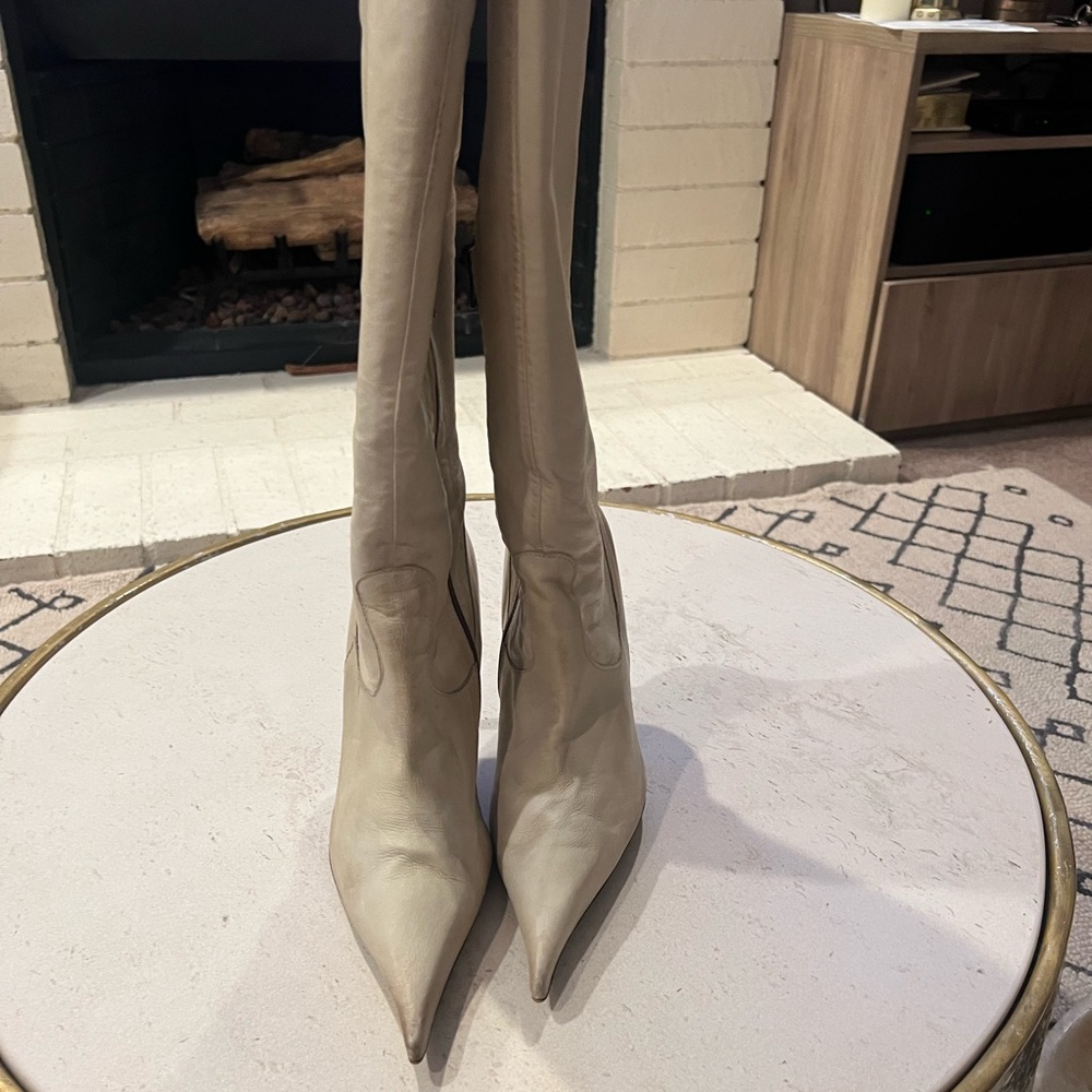 Knee high distressed off white boots